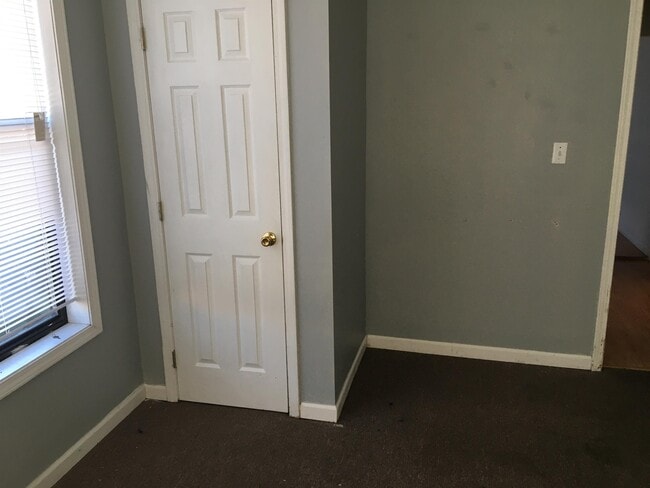 Building Photo - 105 E Texas Ave