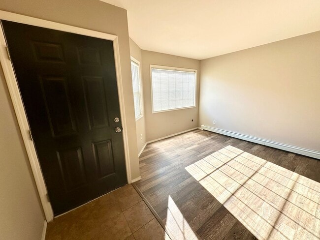 Building Photo - Introducing the Perfect Townhouse Steps Away from Central WA University!