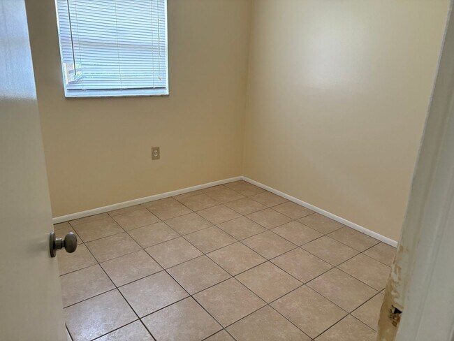 Building Photo - Spacious home on shaded lot off the main path