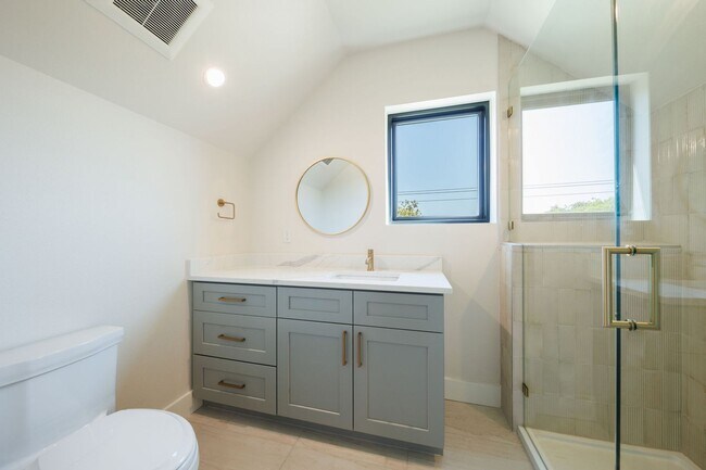 Building Photo - Luxury Redefined: Experience Vibrant Living in this 3-Bedroom Haven in East Austin