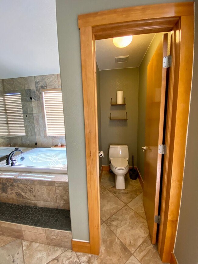Building Photo - Immaculate 4 bed 3.5 Bath with Mountain Views and Unique Amenities!  Pet Friendly! Desirable 80922!