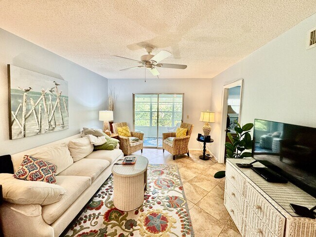 Building Photo - Fully Furnished 2 bedroom/ 2 bath with tranquil views in 55+ Community