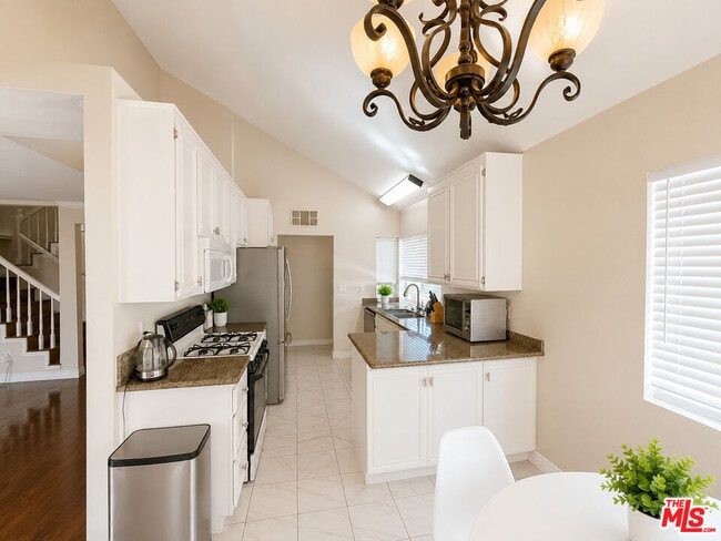 Building Photo - 8950 Serapis Ave