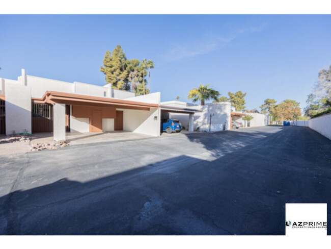 Building Photo - Live Large in This Captivating 2/2 Townhom...