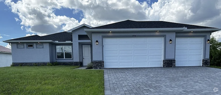 Building Photo - 4 Bedroom 2 bathroom 3 Car Garage NE Cape ...