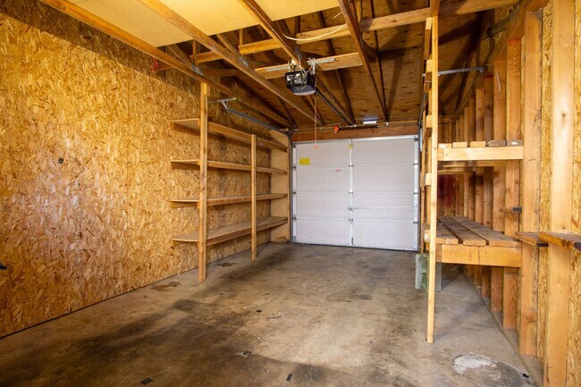 Building Photo - Updated Townhouse with Garage, Patio, DW, WD + FIREPLACE!!