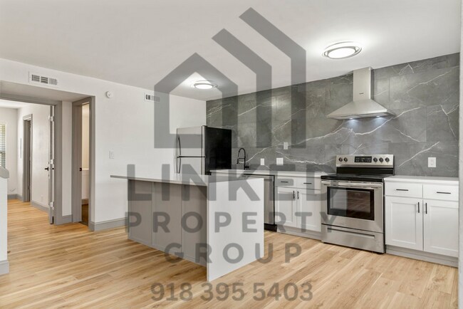 Building Photo - 3711 S Indianapolis Ave
