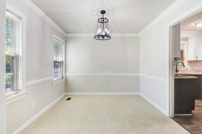 Building Photo - CHARMING 2-STORY BRICK HOME *Excellent Goldsboro Location* Lawn Care Included!