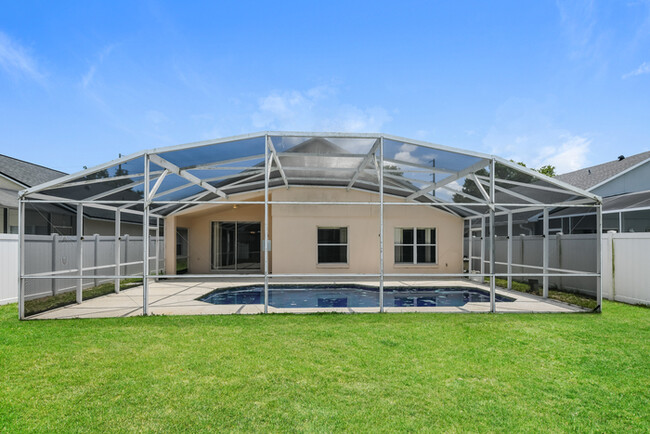 Building Photo - Spacious 4-Bedroom Home with Enclosed Pool