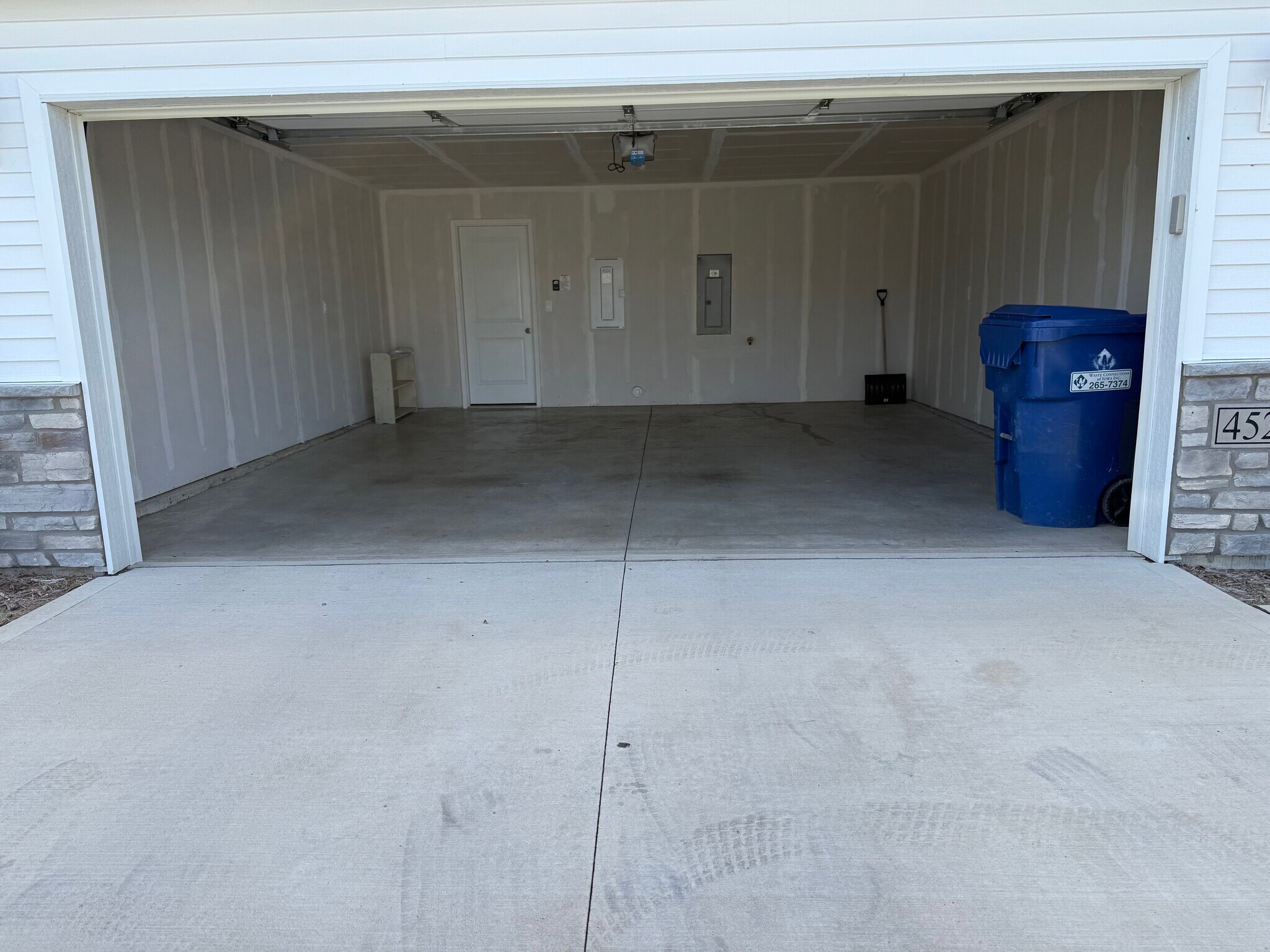 Shoe rack, shovel, trash bin - 4521 SE Ember Ln