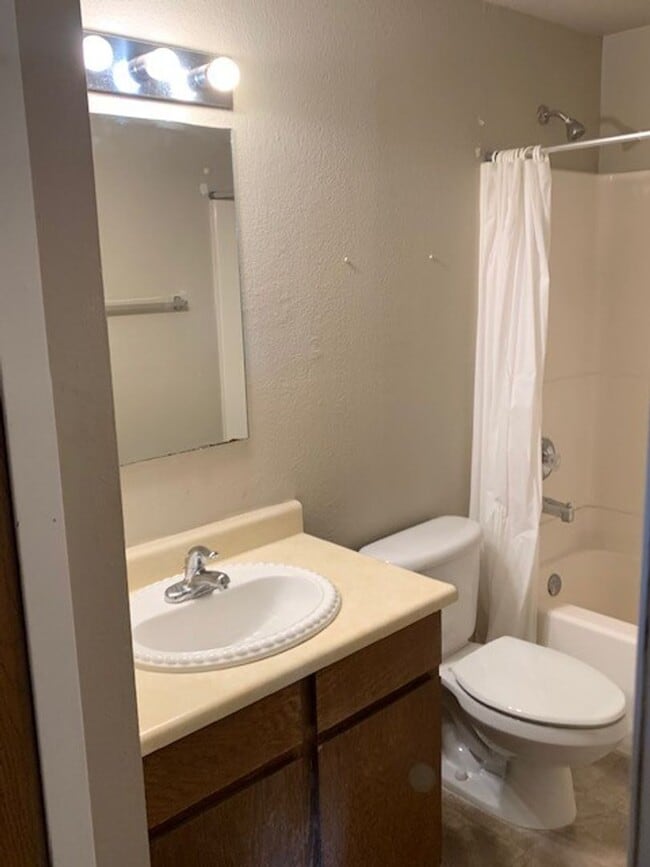 Building Photo - SpringTree Gardens Condominium