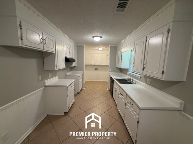 Building Photo - Charming 3BR/2BA Northport Home with Hardwood Floors & Brick Fireplace!