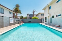 Building Photo - Retro Style Apartment Building with Pool and Gym - Secure, Modern and Lease-Ready!