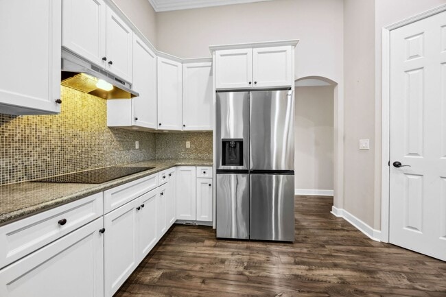 Building Photo - Luxury Living in Amelia National – Resort-...