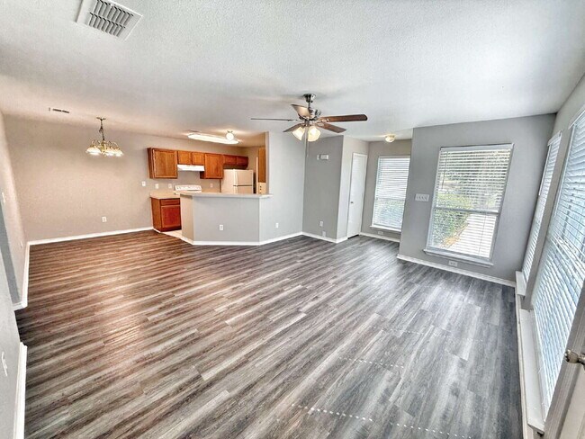 Building Photo - Spacious 3 Bedroom, 2 Bath Duplex with 1-Car Garage – Lawn Care Included!