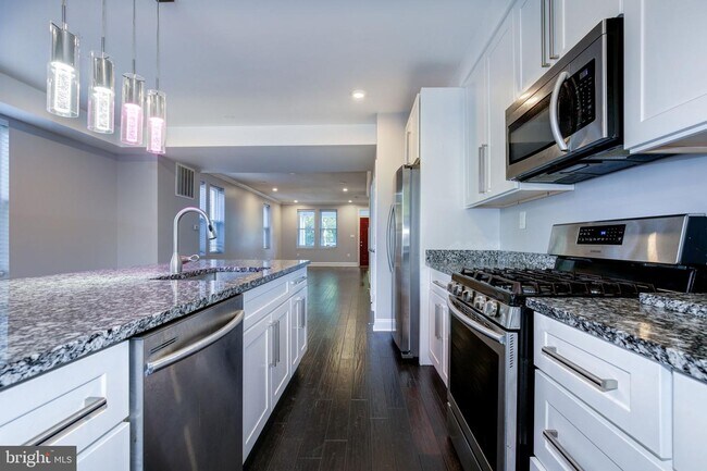 Building Photo - 4209 JENIFER St NW