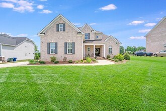 Building Photo - COMING SOON! Live Luxuriously in Summerwood – Fully Furnished 4BR Brick Home w/ Internet & Lawn C...