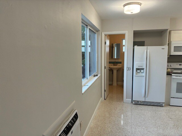 Turn right after entry - 506 NE 23rd St