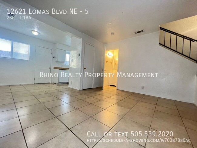 Building Photo - Welcome To The Lomas Townhouse Apartments!...