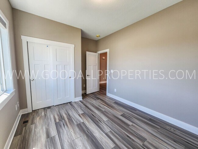 Building Photo - Spacious Waukee Ranch | 4 Bedrooms | 3-Car Garage | Finished Basement