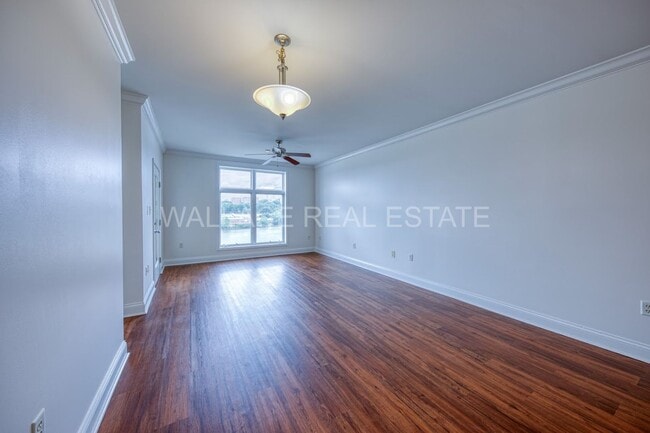 Building Photo - 3 BEDROOM CONDO IN RIVER TOWNE - A GATED LAKEFRONT COMMUNITY!!