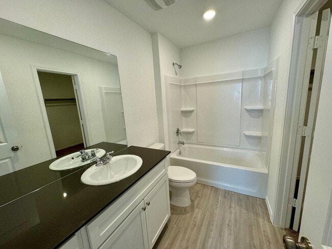 Building Photo - Modern 4-Bedroom Home with Community Pool ...