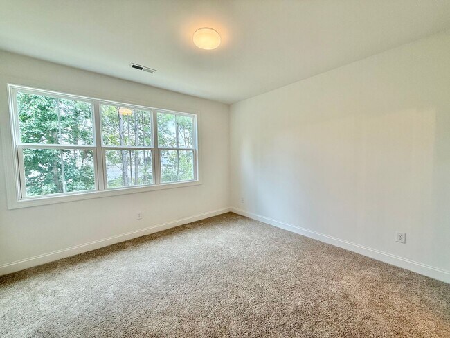 Building Photo - Newly Built 4BD, 3.5BA Northeast Raleigh Townhome in a Great Location