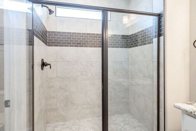 Building Photo - Amazing 4BR 2.5BA Home w/ 3-Car Tandem Garage • Pool Access • Yard w/ Fire Pit in Saguaro Trails