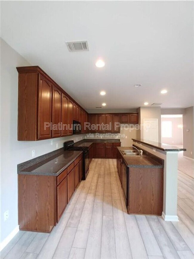 Building Photo - 6205 Park Leaf Walk