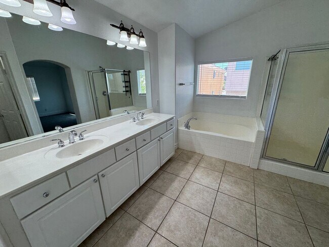 Building Photo - STUNNING 2 STORY HOME IN A GUARD GATED COM...