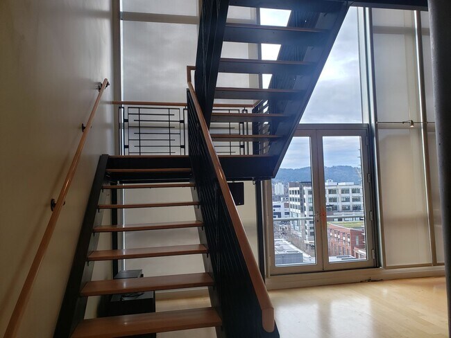 Building Photo - Wonderful Two story Penthouse Condo! Water...