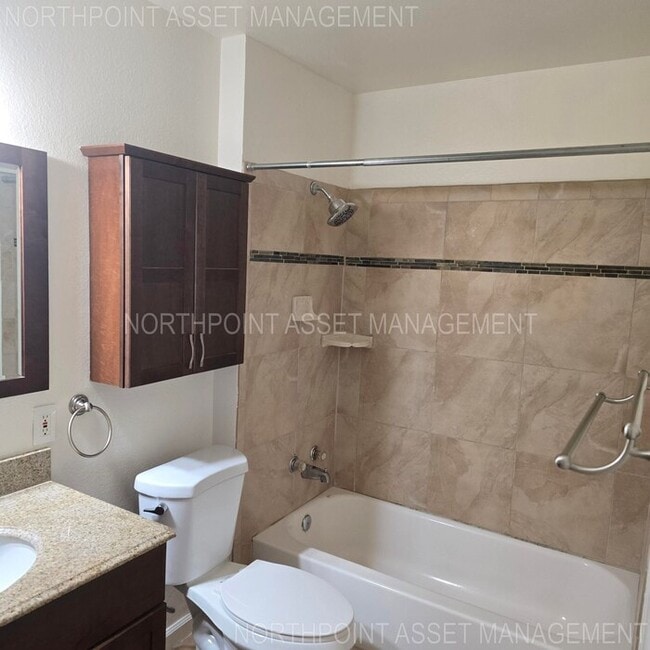 Building Photo - Welcome to this charming 1-bedroom, 1-bath...