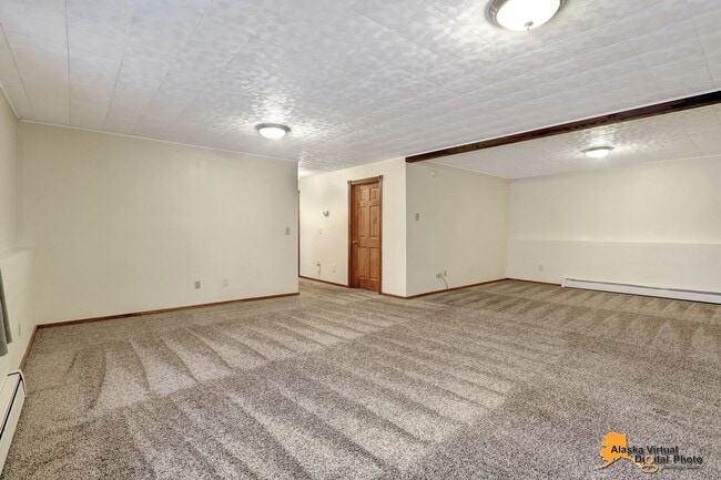 Building Photo - Spacious Home with Garage & Fenced Yard Near JBER & Major Hospitals