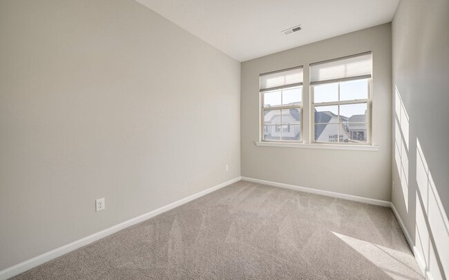 Building Photo - Contemporary, spacious 3-bedroom, 2.5-bath...