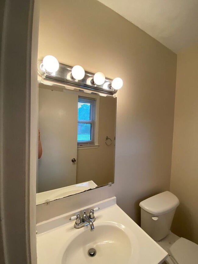 Building Photo - COMING SOON! 4Br, 2.5 baths, large kitchen, large bedrooms, fence, storage and more! N. College R...