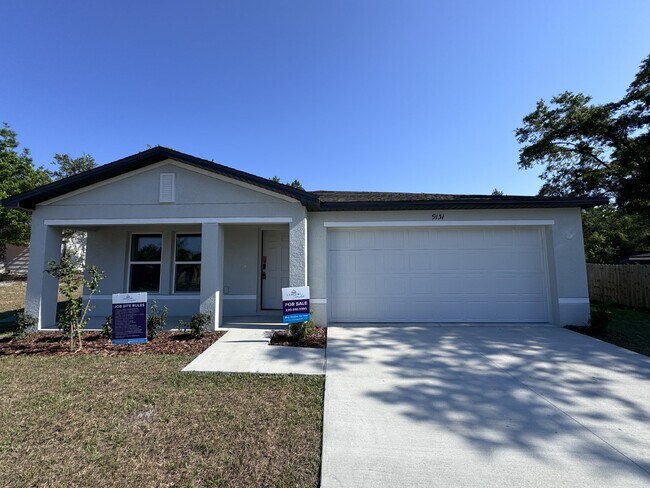 Building Photo - "Charming 4-Bedroom Home in Spring Hill, F...