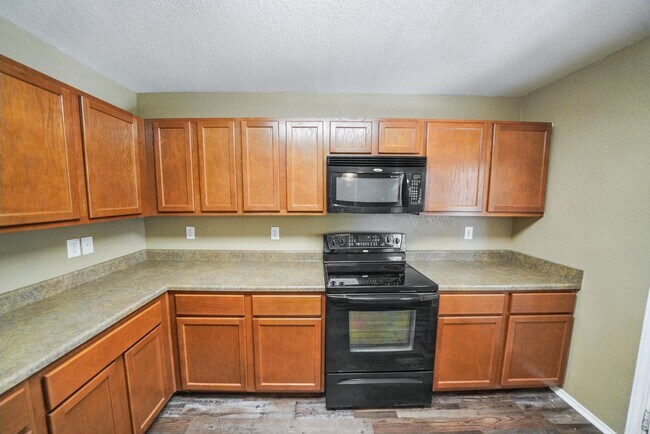 Building Photo - Energy-Smart Single-Story Now Available in...