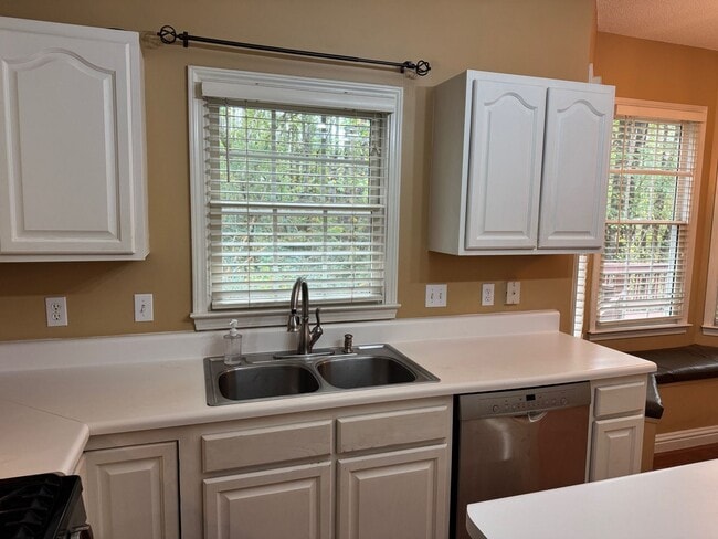 Building Photo - Fletcher - Four Bedroom, Lawn Care Included