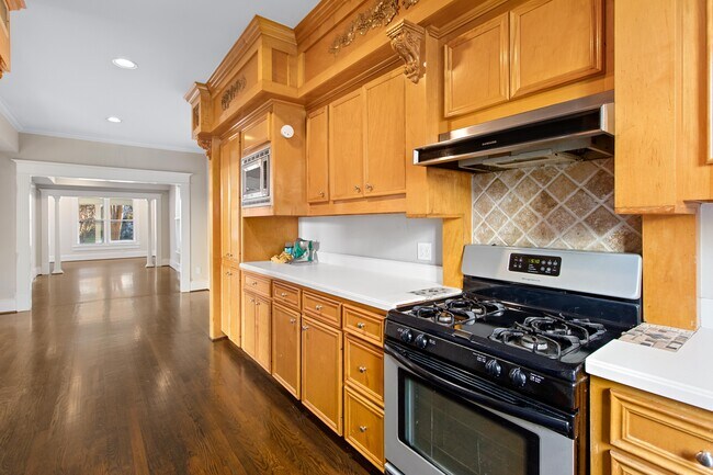 Kitchen view to dining and living room areas - 515 W 17th St