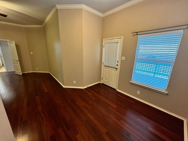 Building Photo - Ready For Move In! A Must See in Rogers Ranch - 4 Bedroom 2 Bath with Custom Features