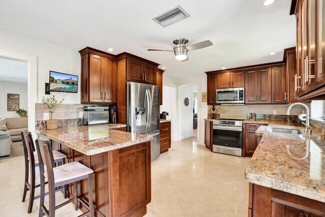 Building Photo - Boca Raton Beautifully Updated 4 Bedroom Pool Home