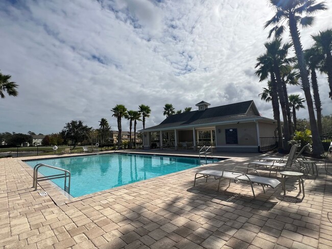 Building Photo - BEAUTIFUL Grande Champion at LPGA Townhome, Lake & Preserve Views, 3 Bedrooms, 2.5 Bathrooms AVAI...