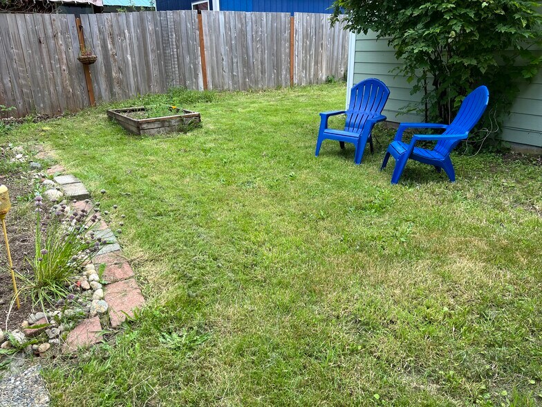 Seating in back yard - 1618 Groves Ave NW