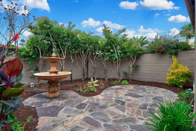 Building Photo - Gated corner lot home walking distance to the beach