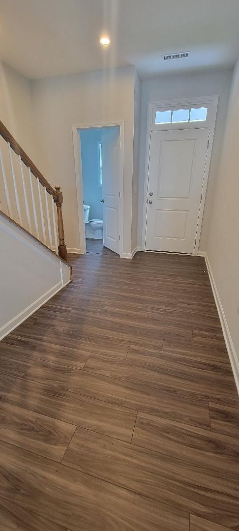 Front door and hallway to the kitchen - 804 Oak Center Dr