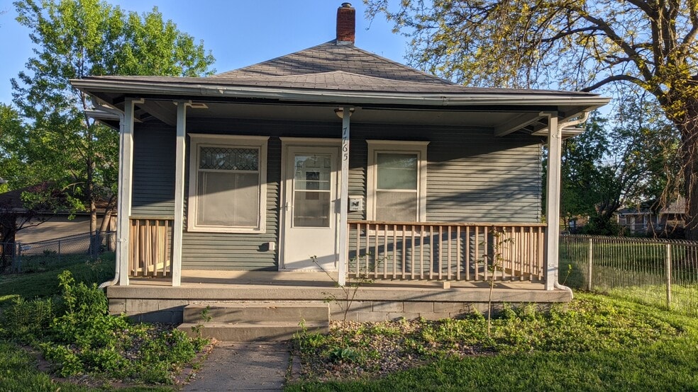 Front door and porch. - 7765 Maywood St