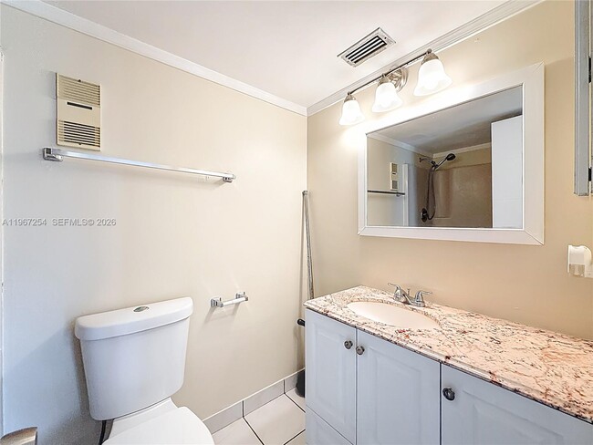 Building Photo - 8740 N Sherman Cir