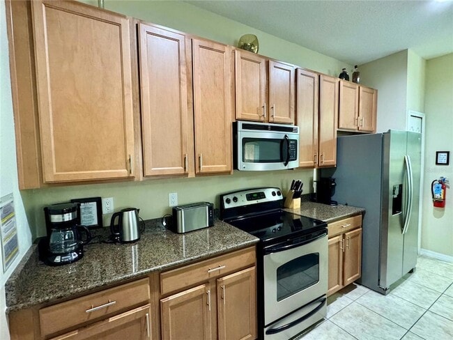 Building Photo - 8977 Coco Palm Rd