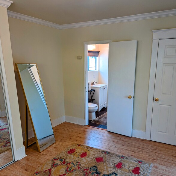 Bedroom 1 and bathroom - 2852 S Palm Grove Ave