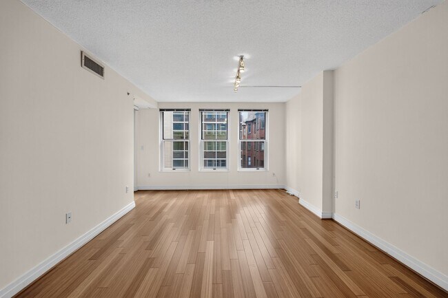 Building Photo - Penn Quarter 1BR Condo with Balcony, Garage Parking, Storage, Concierge, and Rooftop Deck.